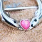Piercing téton dauphins coeur