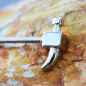 Piercing téton en forme de marteau