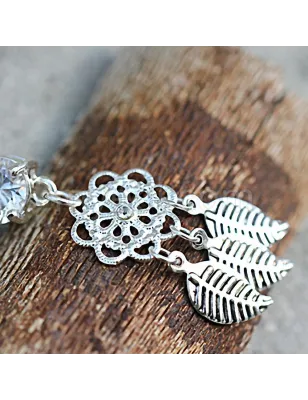 Piercing nombril fleur trois feuilles