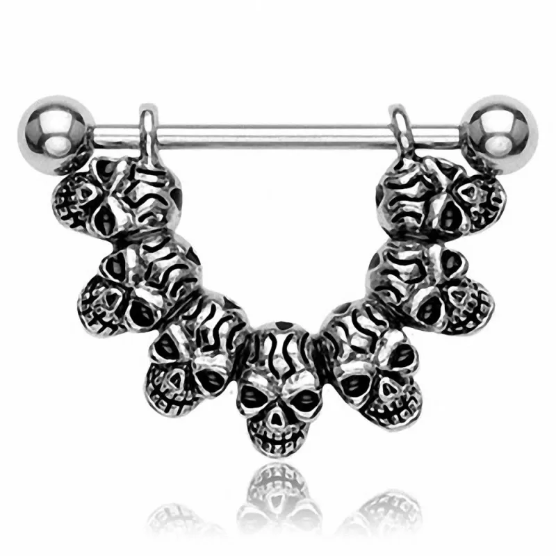 Piercing téton sept crânes Piercing téton sept crânes