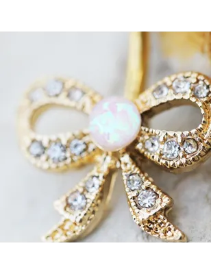 Piercing nombril plaqué or noeud opale