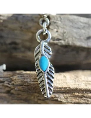 Piercing cartilage hélix plume tribale