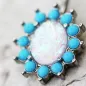 Piercing nombril opale blanche et turquoise