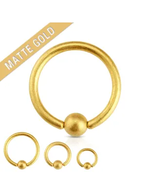 Piercing anneau captif doré mat