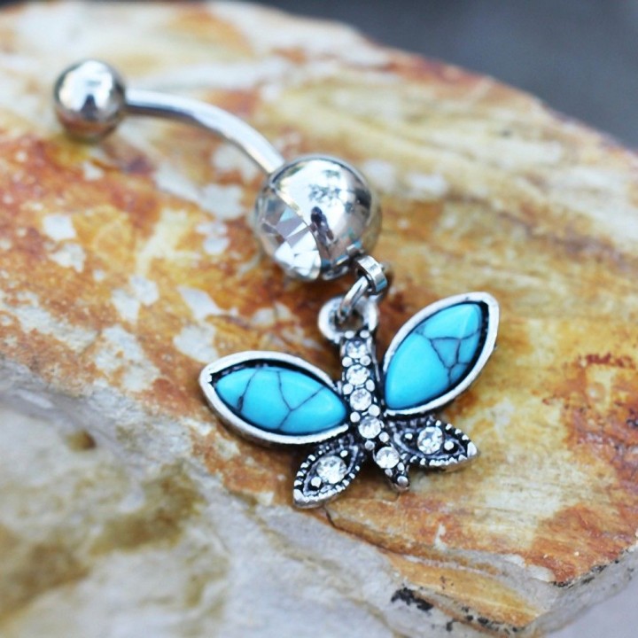 Piercing nombril turquoise papillon