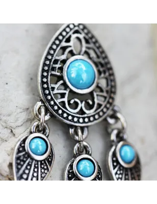 Piercing nombril larme et plumes turquoise