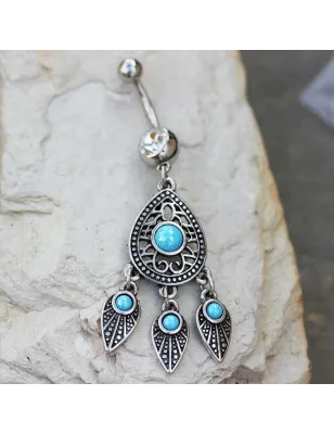 Piercing nombril larme et plumes turquoise