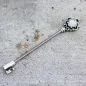 Piercing oreille industriel clef victorienne