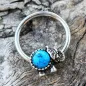 Piercing anneau captif éléphant turquoise