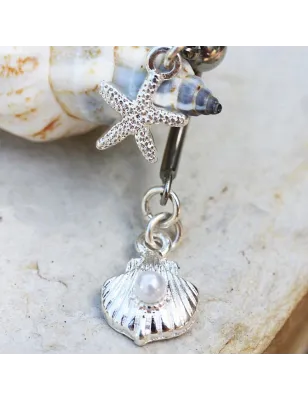 Piercing nombril étoile de mer et coquillage