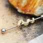 Piercing industriel serpent doré