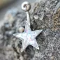 Piercing nombril étoile aurore boréale