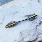 Piercing téton plume dorée