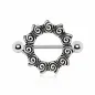 Piercing téton bouclier tribal spirales