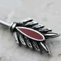 Piercing téton flèche et plume rouge