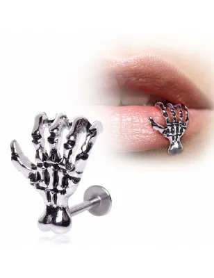 Piercing labret décalé main de zombie