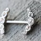 Piercing téton bouclier multiples gemmes