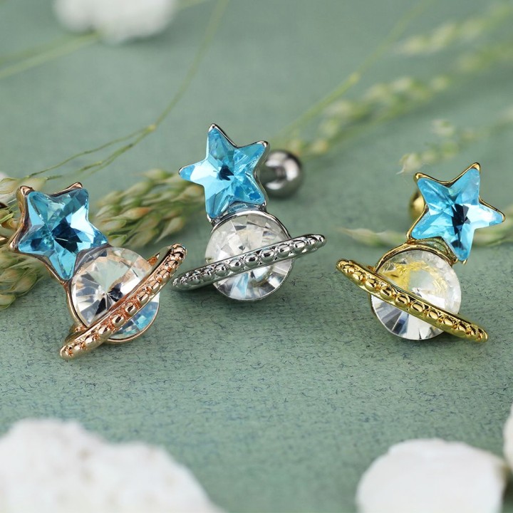 Piercing hélix étoile turquoise et saturne plaqué or