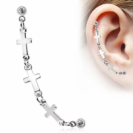 Double piercing cartilage oreille étoile croix