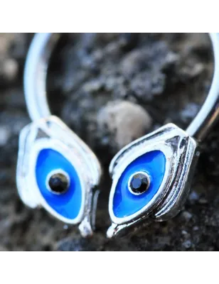 Piercing fer à cheval yeux égyptiens bleus