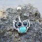 Piercing nombril hibou turquoise