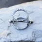Piercing téton bouclier cylindre gemmes