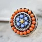 Piercing téton multiples perles orange bleu