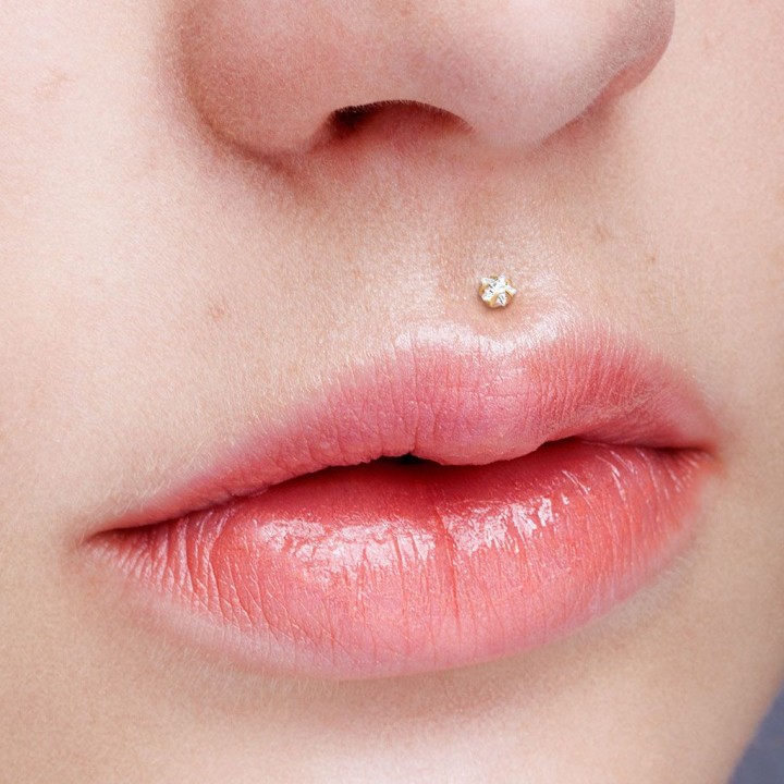 Piercing labret Bioflex Téflon strass étoile embout doré