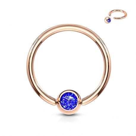 Piercing anneau captif or rosé cristal bleu