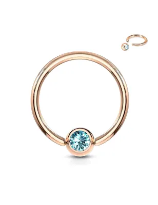 Piercing anneau captif or rosé cristal turquoise