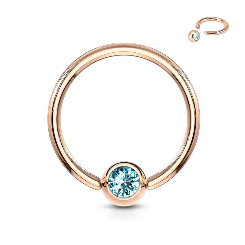 Piercing anneau captif or rosé cristal turquoise