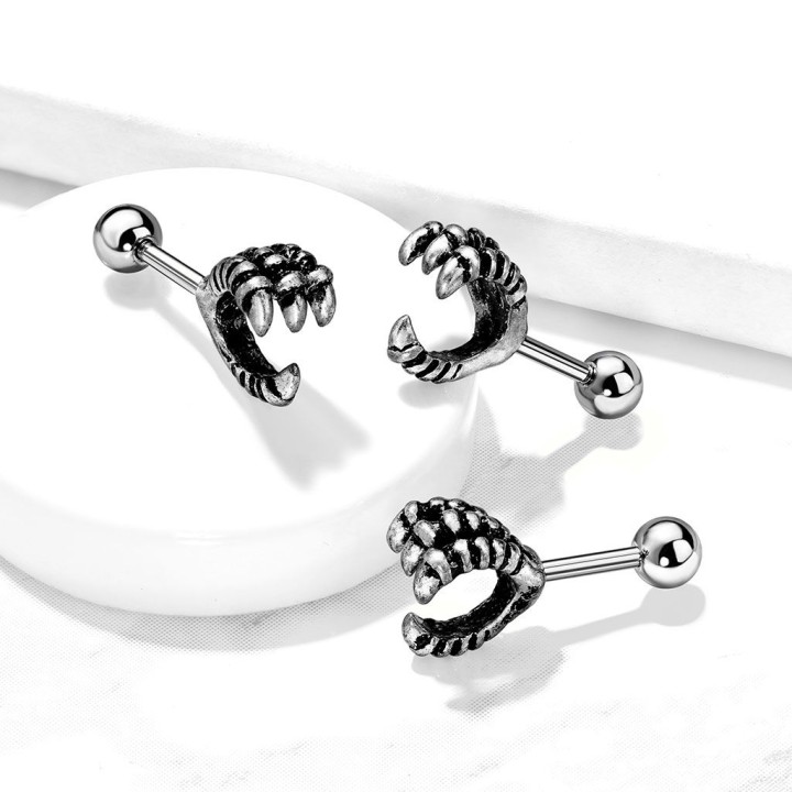 Piercing cartilage hélix griffe d'aigle