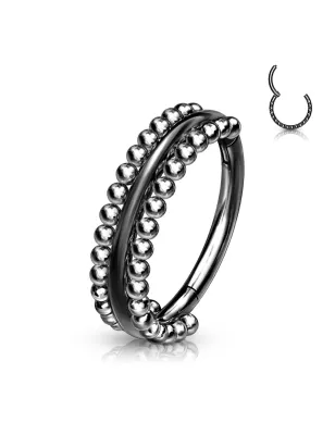 Piercing anneau oreille noir bordures perlées