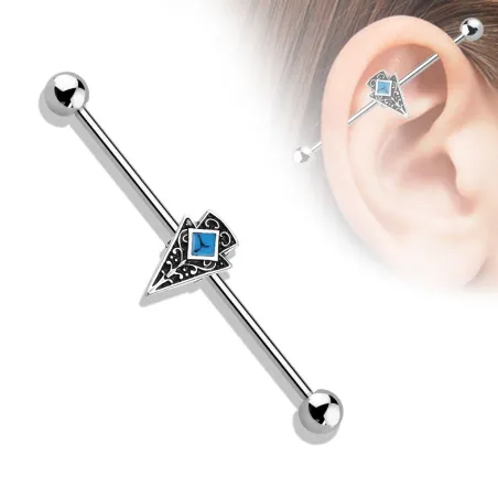 Piercing industriel oreille flèche tribale