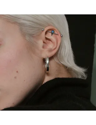 Piercing industriel oreille flèche tribale