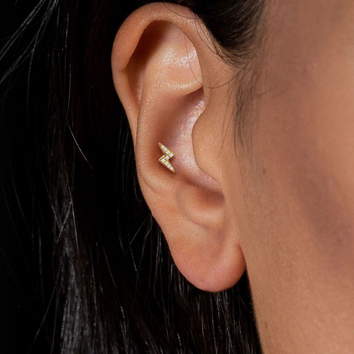 Piercing labret oreille éclair pavé de strass acier doré