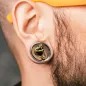 Piercing tunnel oreille avec cobra doré